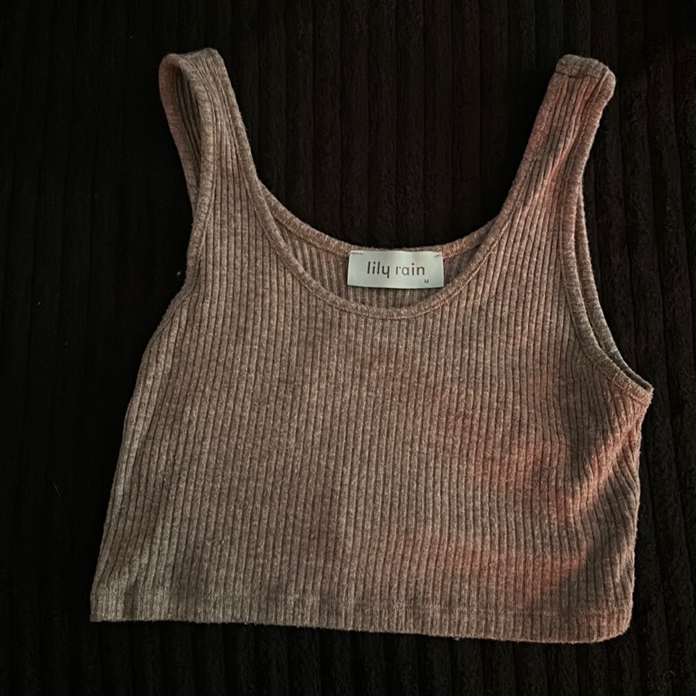 Super cute, beige: rayon, polyester, nylon crop top size medium. Never word.